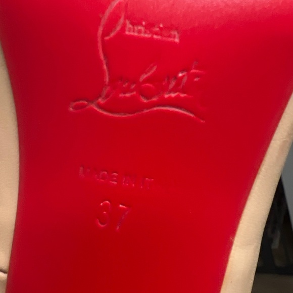 Tan authentic pointed toe stiletto in very good pre owned...